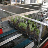 Vermiculietstrooier en waterunit t.b.v. trays